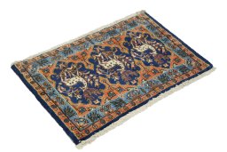 Corner detail of 1990s Tabriz rug showing border pattern and Wool pile