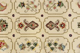 Close-up detail of New Tabriz rug from Iran / Persia showing Wool weave