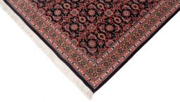 Close-up detail of New Tabriz rug from Iran / Persia showing Wool weave