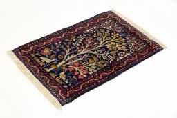 Corner detail of 2000s Tabriz rug showing border pattern and Wool pile