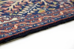 Central medallion detail of 2000s Tabriz rug from Iran / Persia