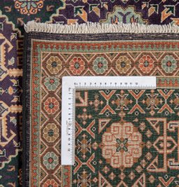 Close-up detail of New Tabriz rug from Iran / Persia showing Wool weave