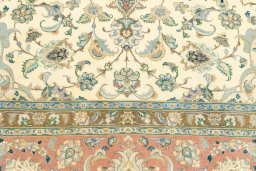 Close-up detail of 2019s Tabriz rug from Iran / Persia showing Wool weave