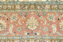 Surface texture of 2019s Tabriz rug with natural Wool and intricate pattern