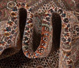 Surface texture of New Tabriz rug with natural Wool and intricate pattern