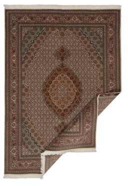 Central medallion detail of New Tabriz rug from Iran / Persia