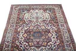 Surface texture of 1900s Tehran rug with natural Wool and intricate pattern