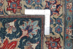 Surface texture of 1950s Tehran rug with natural Wool and intricate pattern