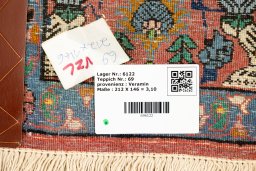 Corner detail of 1940s Varamin rug showing border pattern and Wool pile