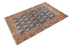 Corner detail of 1940s Varamin rug showing border pattern and Wool pile
