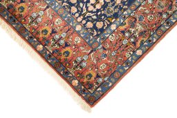 Backside of handmade 1940s Varamin rug showing knot structure and weave density