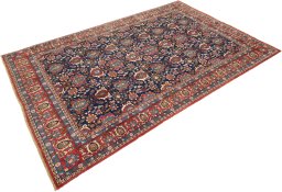 Corner detail of 1950s Varamin rug showing border pattern and Wool pile