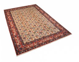 Corner detail of 2000s Varamin rug showing border pattern and Wool pile