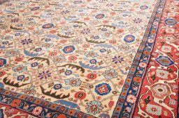 Surface texture of 2000s Varamin rug with natural Wool and intricate pattern