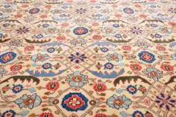 Backside of handmade 2000s Varamin rug showing knot structure and weave density