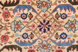 Corner detail of 2000s Varamin rug showing border pattern and Wool pile