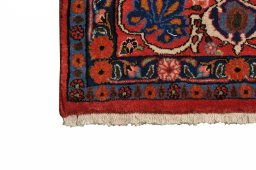 Surface texture of 2000s Varamin rug with natural Wool and intricate pattern