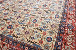 Surface texture of 2000s Varamin rug with natural Wool and intricate pattern