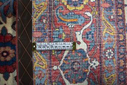 Close-up detail of 2000s Varamin rug from Iran / Persia showing Wool weave