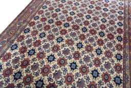 Backside of handmade 2000s Varamin rug showing knot structure and weave density