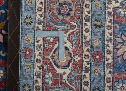 Close-up detail of 1950s Varamin rug from Iran / Persia showing Wool weave