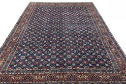 Surface texture of 1950s Varamin rug with natural Wool and intricate pattern