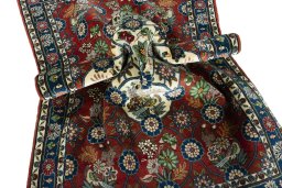 Close-up detail of New Varamin rug from Iran / Persia showing Wool weave