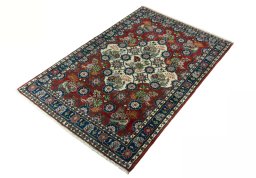 Corner detail of New Varamin rug showing border pattern and Wool pile