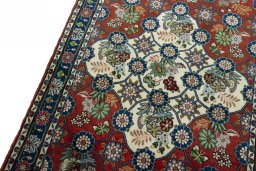 Backside of handmade New Varamin rug showing knot structure and weave density