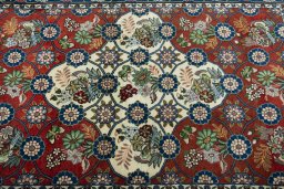 Central medallion detail of New Varamin rug from Iran / Persia
