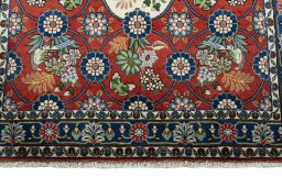 Close-up detail of New Varamin rug from Iran / Persia showing Wool weave