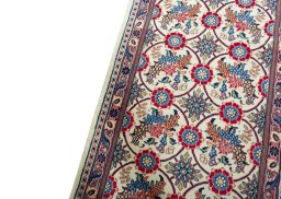 Backside of handmade New Varamin rug showing knot structure and weave density