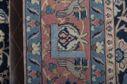 Backside of handmade 2000s Varamin rug showing knot structure and weave density