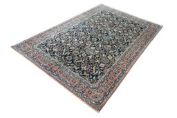 Corner detail of 2000s Varamin rug showing border pattern and Wool pile