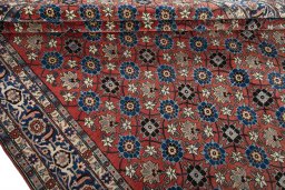 Close-up detail of 1950s Varamin rug from Iran / Persia showing Wool weave