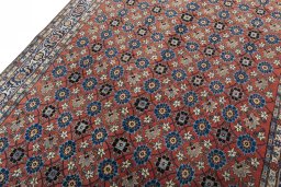 Backside of handmade 1950s Varamin rug showing knot structure and weave density