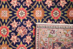 Close-up detail of 1980s Varamin rug from Iran / Persia showing Wool weave