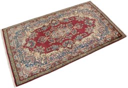 Corner detail of 1950s Yazd rug showing border pattern and Wool pile