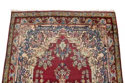 Surface texture of 1950s Yazd rug with natural Wool and intricate pattern