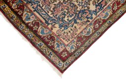 Backside of handmade 1950s Yazd rug showing knot structure and weave density