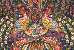 Close-up detail of 1920s Yazd rug from Iran / Persia showing Wool weave