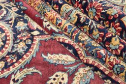 Corner detail of 1930s Yazd rug showing border pattern and Wool pile