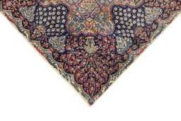 Backside of handmade 1930s Yazd rug showing knot structure and weave density