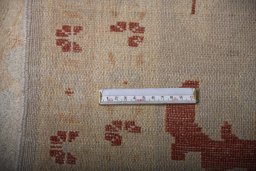 Corner detail of New Yazd rug showing border pattern and Wool pile