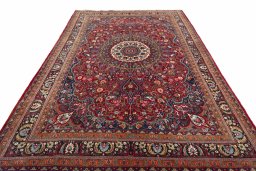 Surface texture of 2000s Yazd rug with natural Wool and intricate pattern