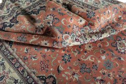 Surface texture of 2000s Yazd rug with natural Wool and intricate pattern