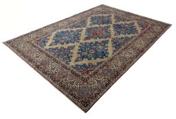 Corner detail of 1970s Yazd rug showing border pattern and Wool pile