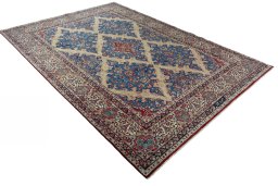 Close-up detail of 1970s Yazd rug from Iran / Persia showing Wool weave