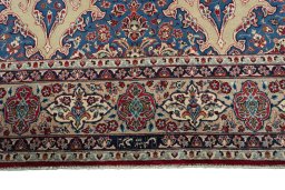 Full view of 1970s Yazd rug from Iran / Persia, 356 × 249 cm in Blue tones