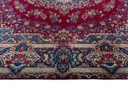 Corner detail of 1970s Yazd rug showing border pattern and Wool pile